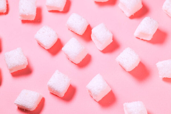 White Marshmallow on the pink background