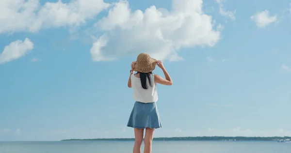 Woman looking at the sea