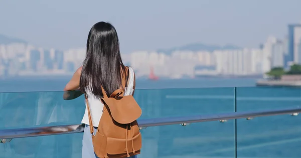 Woman looking  at sea view in Hong Kong