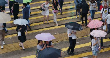 Merkez, Hong Kong, 14 Ekim 2018:-kişi arası yol yağmur gün