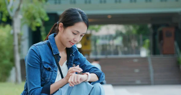 Woman using smart watch