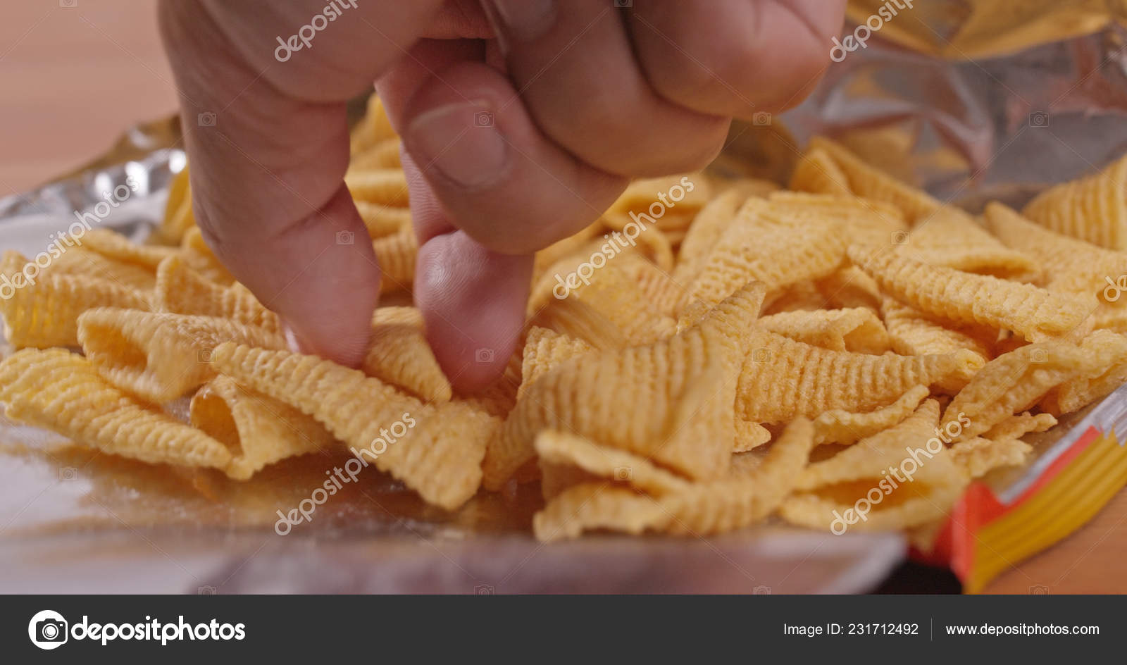 Eating Corn Potato Chips Stock Photo by ©leungchopan 231712492