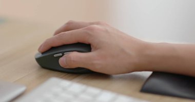 Woman using computer closeup