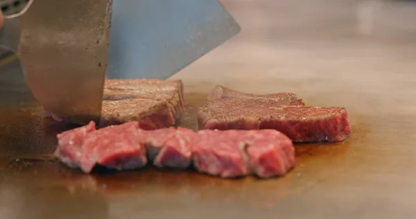 Cooking Teppanyaki in restaurant close-up