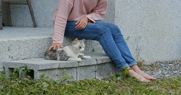 Woman Cuddling Cat Outdoors — 스톡 사진