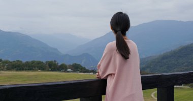 Woman tourist enjoy the view at luye highland in Taitung