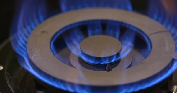 Stove Burner Igniting Blue Cooking Flame — Stock Photo, Image