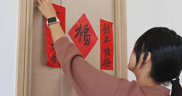 Woman Stick Red Calligraphy Door Decorating Home Chinese New Year — Stock Photo, Image