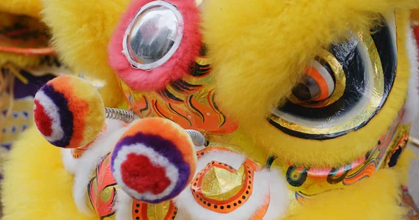 Chinese lion dance in yellow