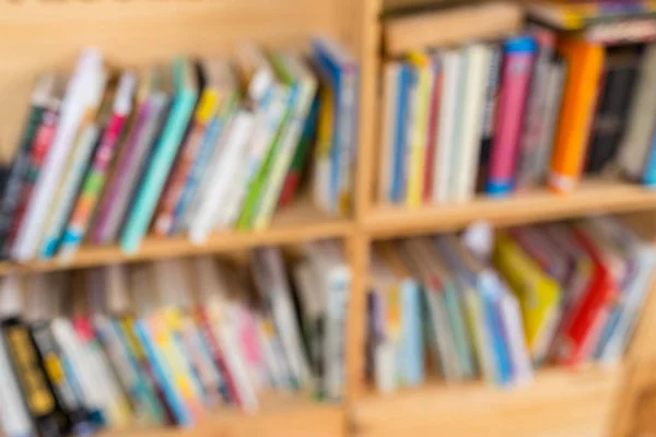 Blur view of bookshelves with books