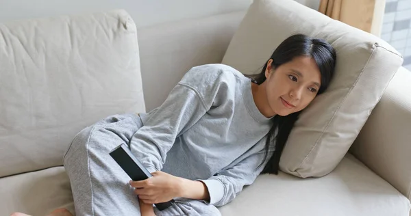 Woman Lying Sofa Watch Home — 스톡 사진