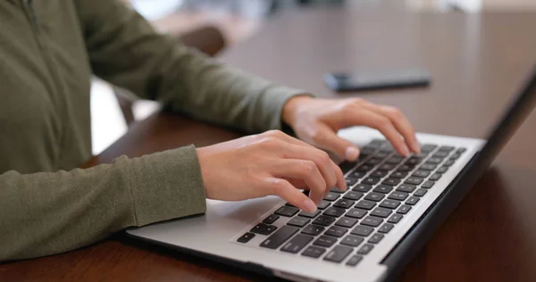 Woman type on computer