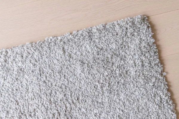 Beigefarbener Teppich Auf Dem Boden — Stockfoto