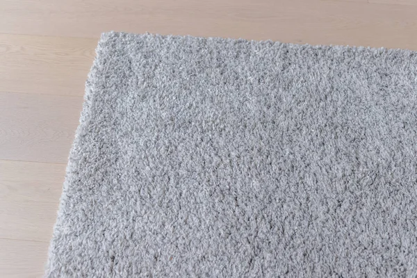 Gray carpet on the floor at home