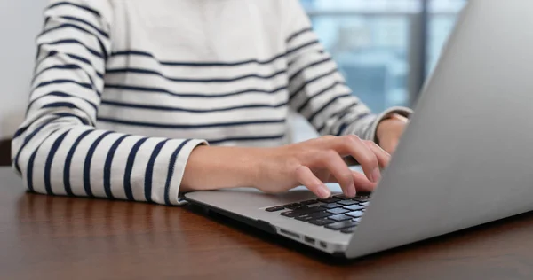 Woman type on laptop computer