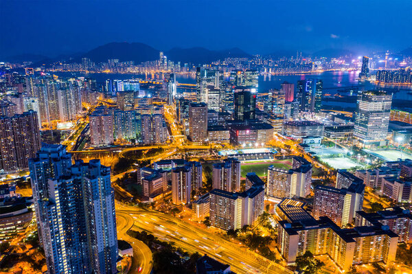 Kowloon Bay, Hong Kong - 25 April, 2019: Aerial view of Hong Kong city at night