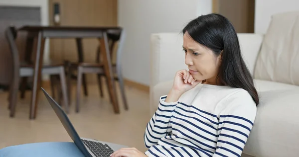 Woman feel trouble on using computer at home