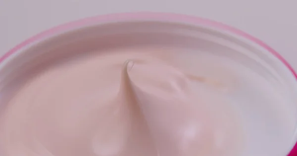 Close up of Pink cosmetics cream