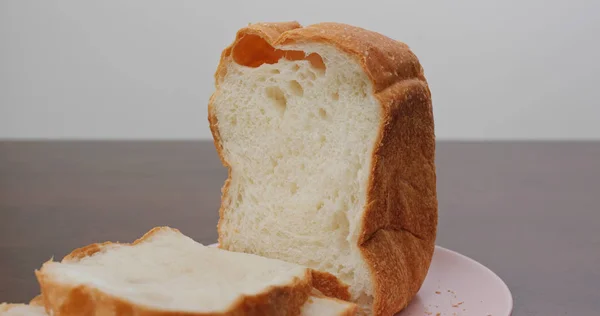 Cut white baked homemade white bread — Stock Photo, Image