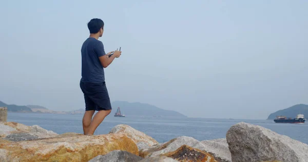 Asian man control with fly drone — Stock Photo, Image