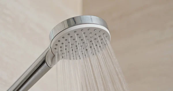 Water flow in the shower head — Stock Photo, Image