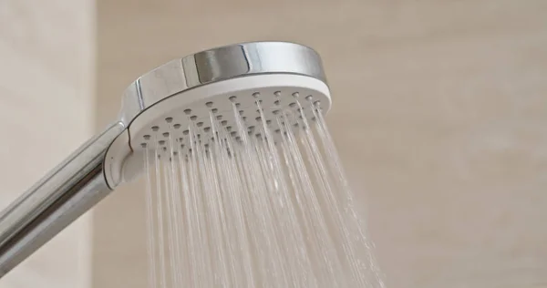 Water flow in the shower head — Stock Photo, Image