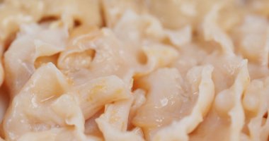 Sıcak çömlek için taze Geoduck sashimi.