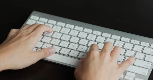 Woman Types Computer Royalty Free Stock Photos