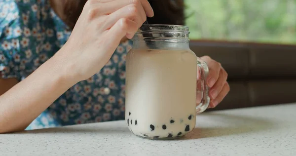 Woman drink of bubble milk tea in restaurant