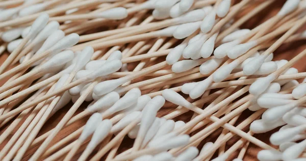 Wooden cotton swab in pile