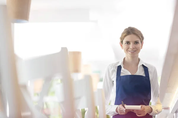 Portrait Smiling Young Waitress Standing Notepad Restaurant — Stock Photo, Image