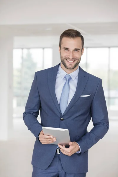 Portrait Handsome Young Businessman Standing Digital Tablet New Office — Stock Photo, Image