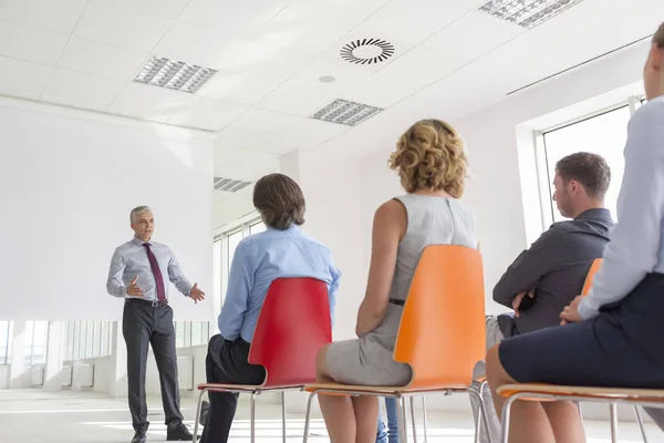 Mature Businessman Explaining Strategy Colleagues Office Meeting — Stock Photo, Image