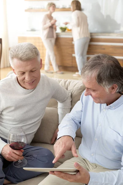 Mature Men Using Digital Tablet Living Room Home — Stock Photo, Image