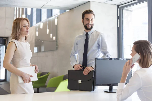 Colleagues Looking Businesswoman Talking Phone Office — Stock Photo, Image