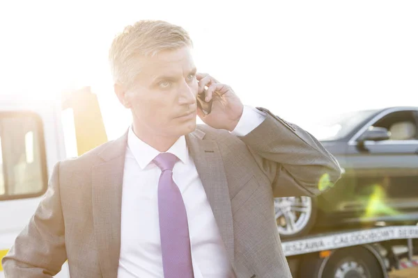 Businessman Talking Smartphone While Tow Truck Picking His Car — Stock Photo, Image