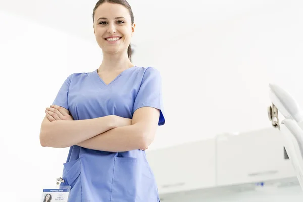 Portrait Confident Smiling Nurse Arms Crossed Clinic — Stock Photo, Image