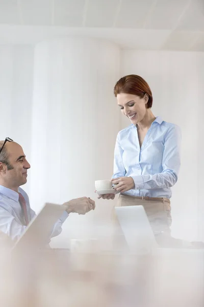 Smiling Businesswoman Giving Coffee Cup Businessman Boardroom Office — Stock Photo, Image
