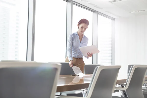 Young Businesswoman Arranging Documents Conference Table Bright Boardroom Office — Stock Photo, Image