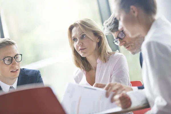 Business Colleagues Discussing Documents While Sitting Table Meeting Office Lobby — Stock Photo, Image