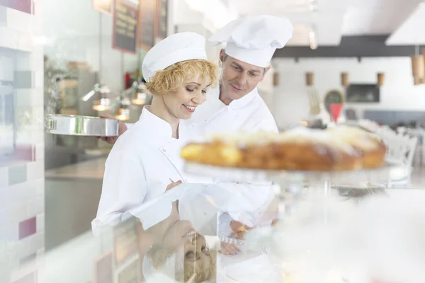 Mature Chef Coworkers Standing Dessert Counter Restaurant — Stock Photo, Image