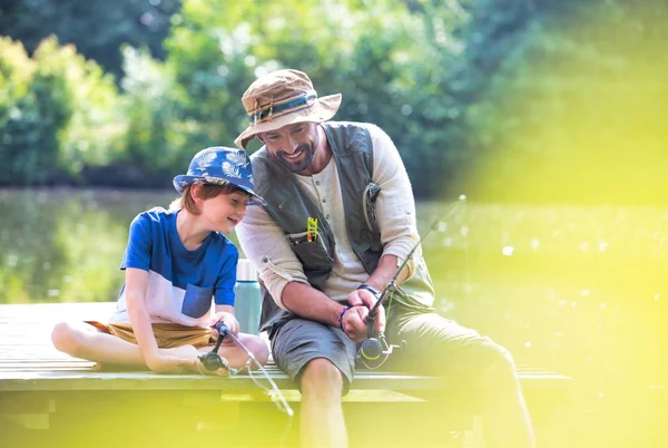 Father Son Fishing Lake While Sitting Pier — Stock Photo, Image