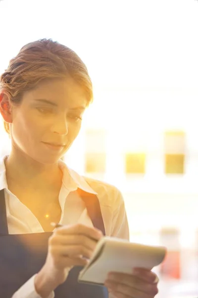 Young Waitress Writing Notepad Restaurant — Stock Photo, Image