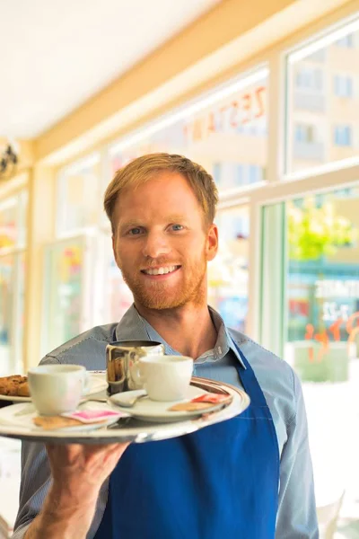 Young Waiter Serving Coffee Cookies Restaurant — Stock Photo, Image