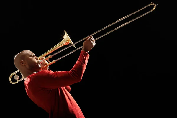 Man Playing Trombone Side View — Stock Photo, Image