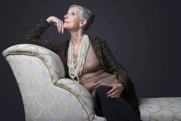 Wealthy Senior Woman Chaise Lounge — Stock Photo, Image