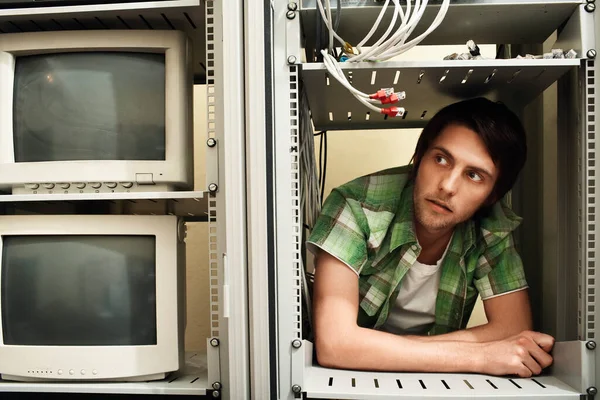 Young Man Surrounded Computer Equipment — Stock Photo, Image