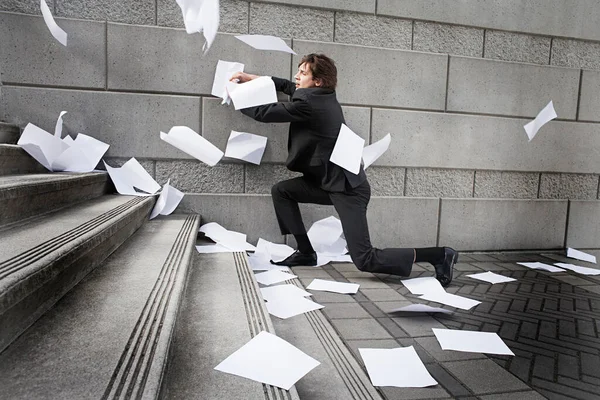 Busines Man Catching Falling Paperwork Steps — Stock Photo, Image