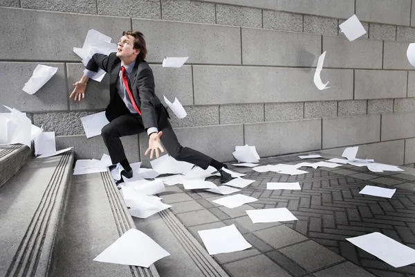 Busines Man Catching Falling Paperwork Steps — Stock Photo, Image