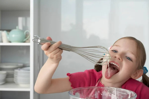 Girl Licking Cream Wire Whisk — Stock Photo, Image